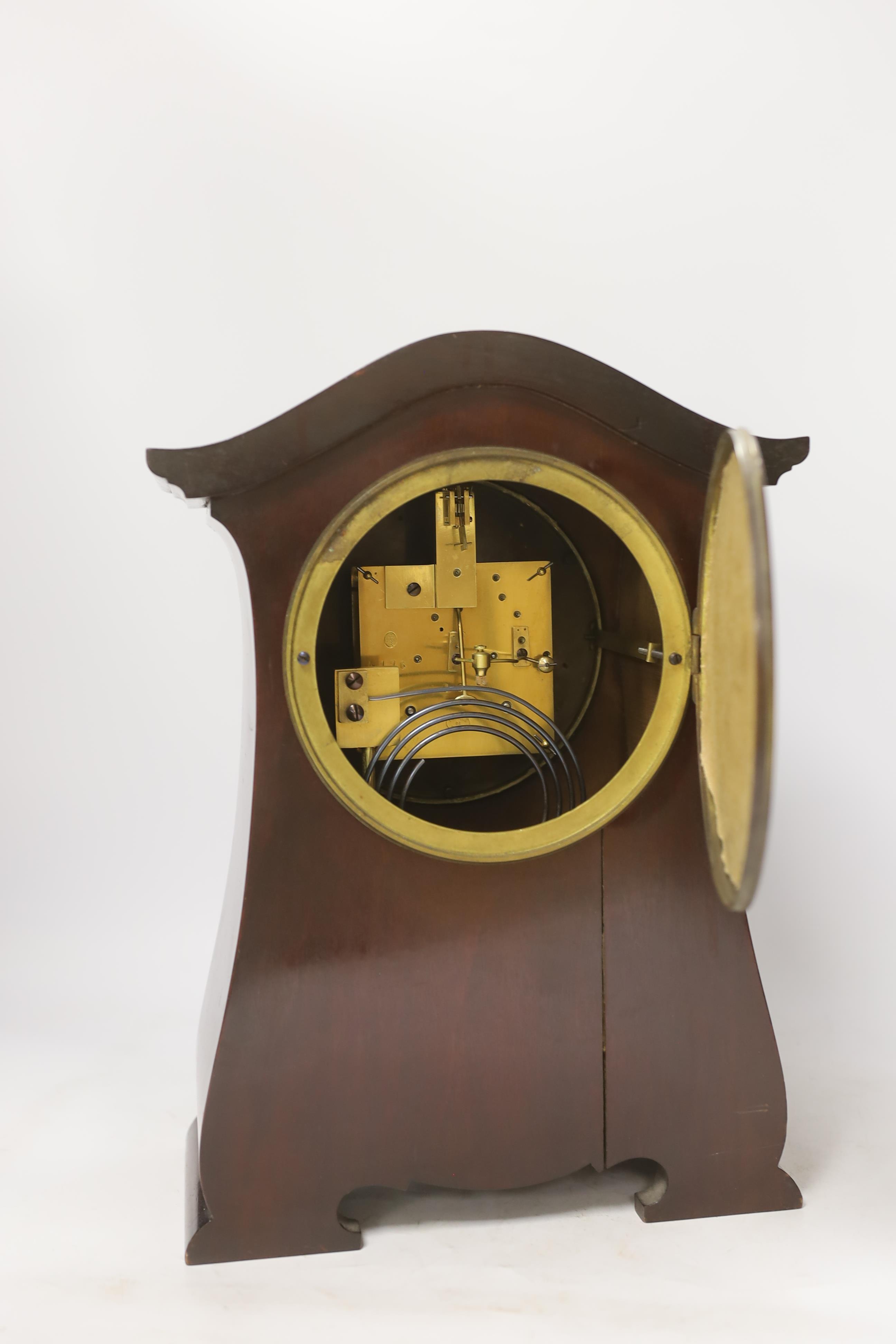 A late Victorian carved mahogany mantel clock, key no pendulum, 35cm